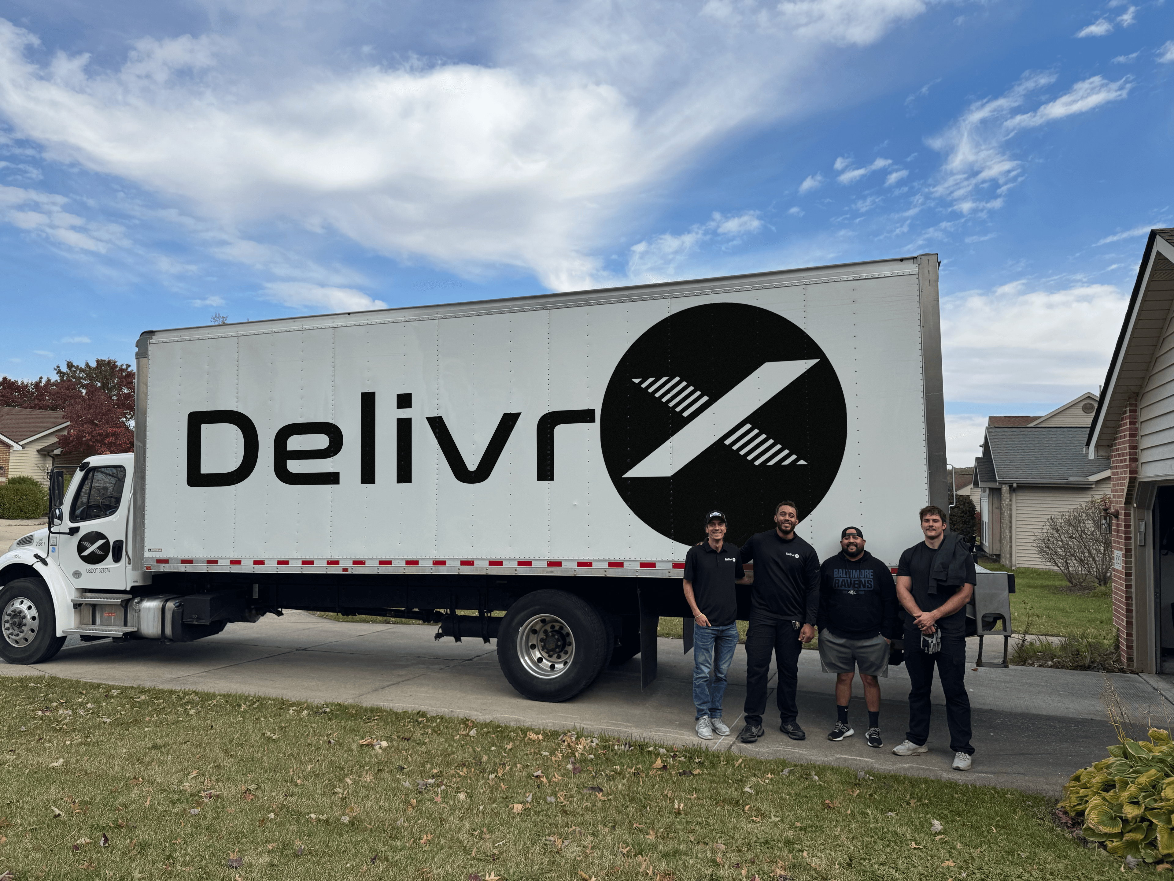 DelivrX team and branded delivery truck